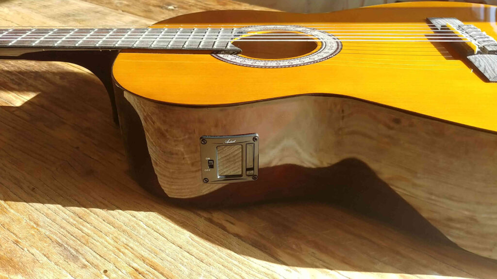 The Artist CL44AM guitar comes with a built-in tuner.